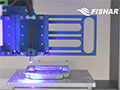 Syringe Dispense with UV Light Cure: F4000 Advance Series Benchtop Robot